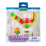 Packaged Ooze Cranium 4-in-1 hybrid water pipe beside assembled Rasta silicone and glass unit