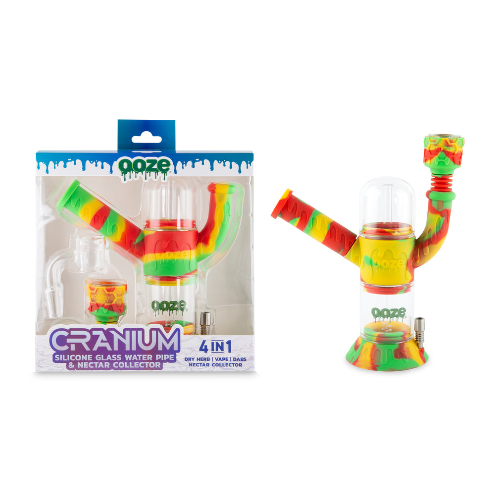 Packaged Ooze Cranium 4-in-1 hybrid water pipe beside assembled Rasta silicone and glass unit
