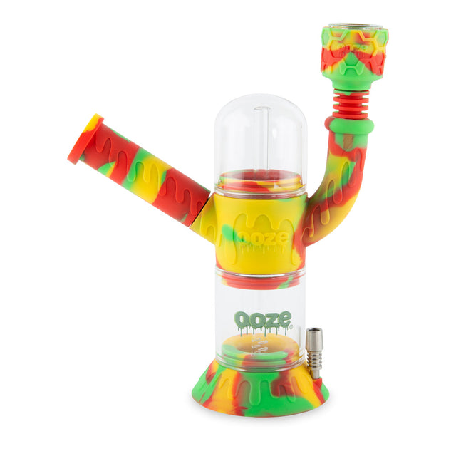 Rasta Ooze Cranium water pipe with skull-style silicone body, clear glass chamber, and bowl