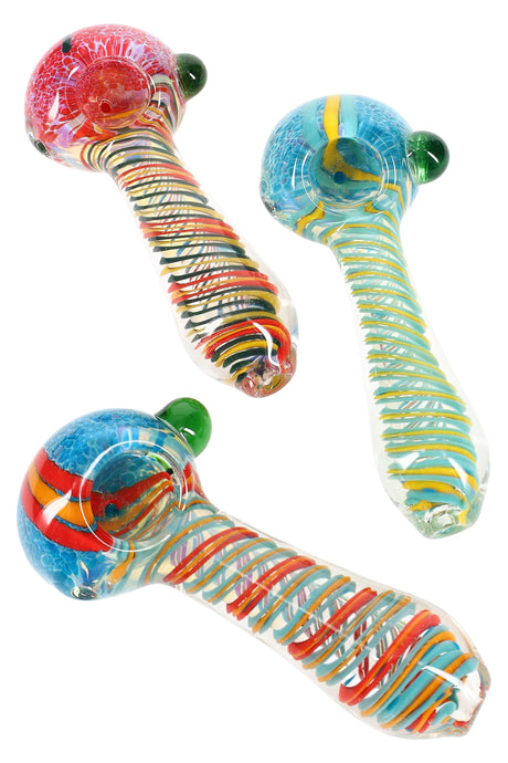 Hand-blown 4.5-inch silver-fumed spoon pipe with color-changing frit bowl, multicolor spiral stripes, deep chamber, and side carb displayed on a white background.