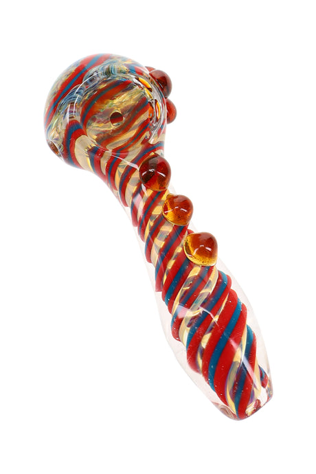 Close-up of 4½″ color-changing frit spoon pipe with red and blue stripes and amber marbles