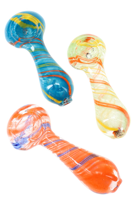 Set of three 3.5-inch striped frit glass spoon pipes in blue, orange and yellow colorways displayed angled on white backdrop