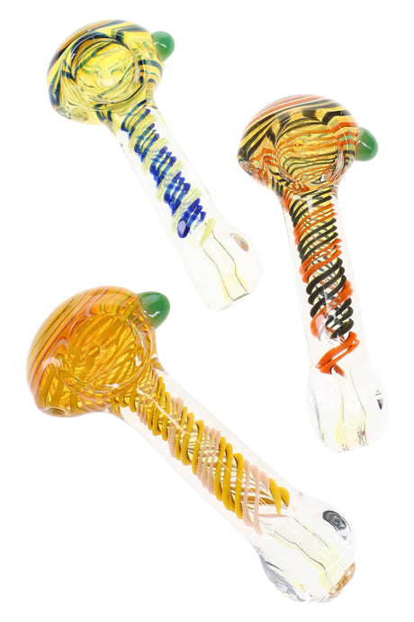 Assorted 4″ color-changing glass spoon pipes with colorful spiral stripes and square mouthpieces