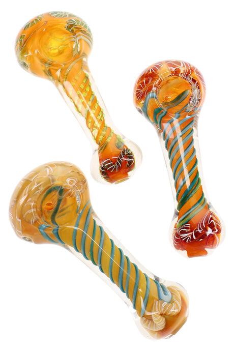 Assorted 4″ gold fumed glass spoon pipes with colorful swirl stripes and compact rounded bowls