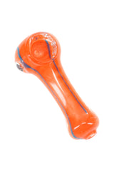 Small 2½ inch striped frit glass spoon pipe with orange and blue swirl accents, compact dry herb hand pipe on white background.