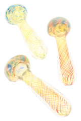 Three assorted gold fumed glass hand pipes “Solar Lattice” showing varied bowl dots and striped swirl stems
