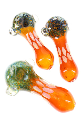 Five-inch gold-fumed color-changing bubble glass spoon pipe with multicolor frit bowl and clear marble roll-stops in assorted warm tones.