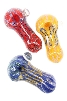 Heavy 4½″ frit glass spoon with bold multicolor stripes, rounded bowl, and clear anti-roll marble; assorted colors, about 225 g.