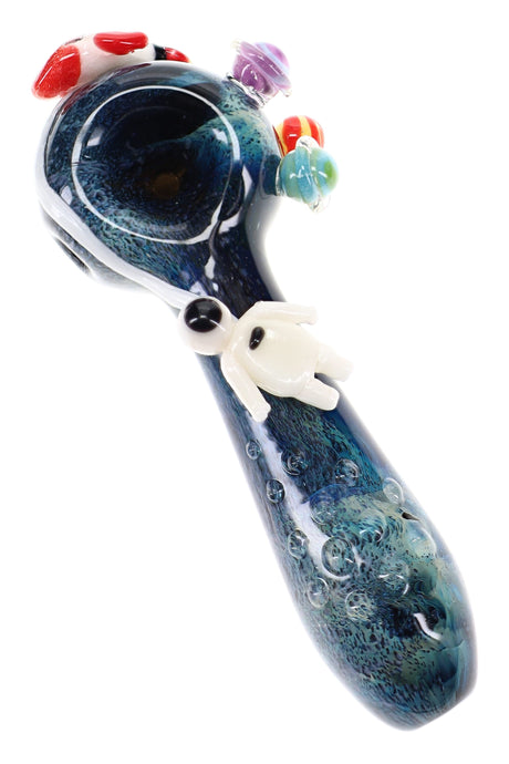 Galaxy-themed glass hand pipe with planet marbles, red rocket, and tiny astronaut on glossy black body