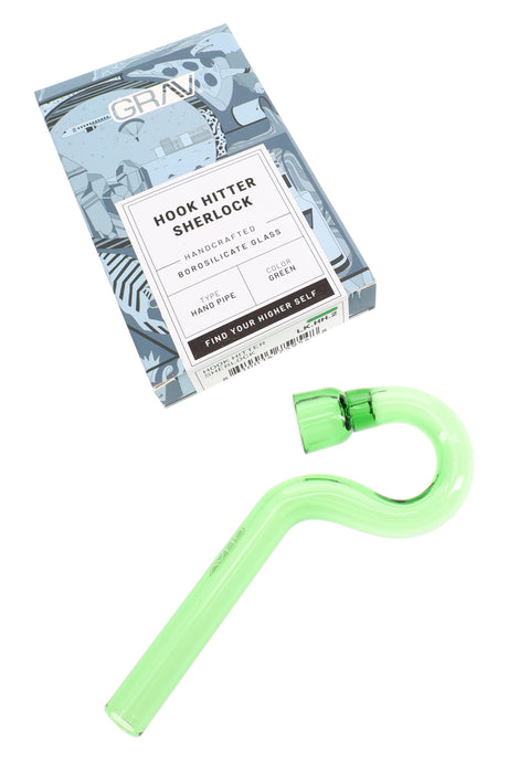 GRAV Hook Hitter sherlock hand pipe in green glass placed beside branded retail box with product details.