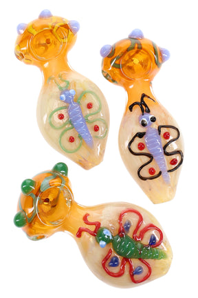 4½″ color-changing fumed glass spoon with sculpted butterfly applique and side carb, shown in assorted colors.