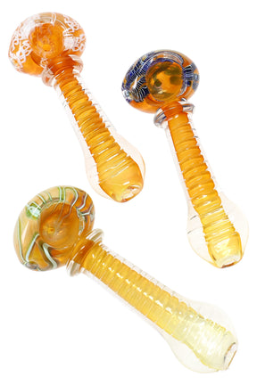 Angled view of three 4-inch gold-fumed ridged glass pipes with assorted blue, green, and white squiggle stripes on the bowl, highlighting its color-changing finish