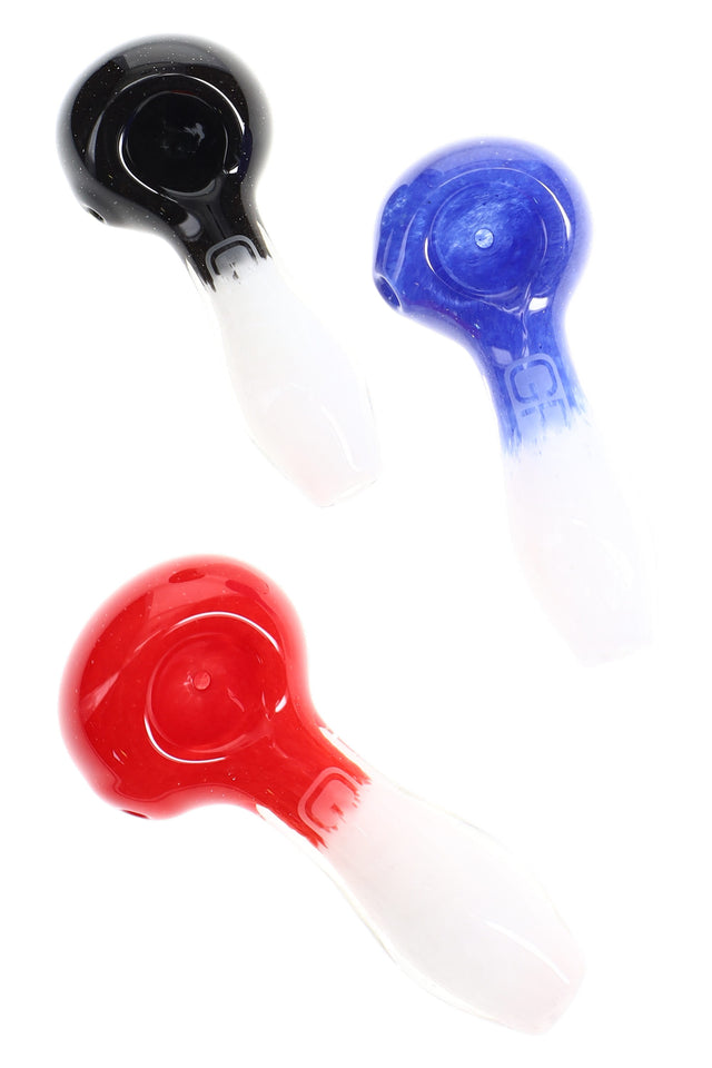 Trio of GRAV 4″ frit glass spoon pipes in red, blue, and black over white, each with glossy two-tone color fade and side carb.