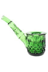 Emerald green 5″ NWTN Highball glass hand pipe with textured cup bowl and curved mouthpiece, reflective vintage patterning on white studio set.