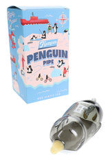 Hemper Penguin glass hand pipe shown in front of bright blue Penguin Pipe box with cartoon arctic graphics on white backdrop.