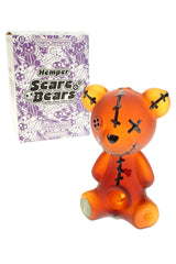 Hemper Scare Bears teddy bear glass hand pipe beside its purple box, showing spooky stitched details and front-loaded bowl.