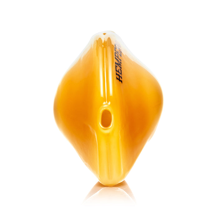 Side profile of yellow fortune cookie glass hand pipe showing HEMPER logo placement and rounded palm grip design
