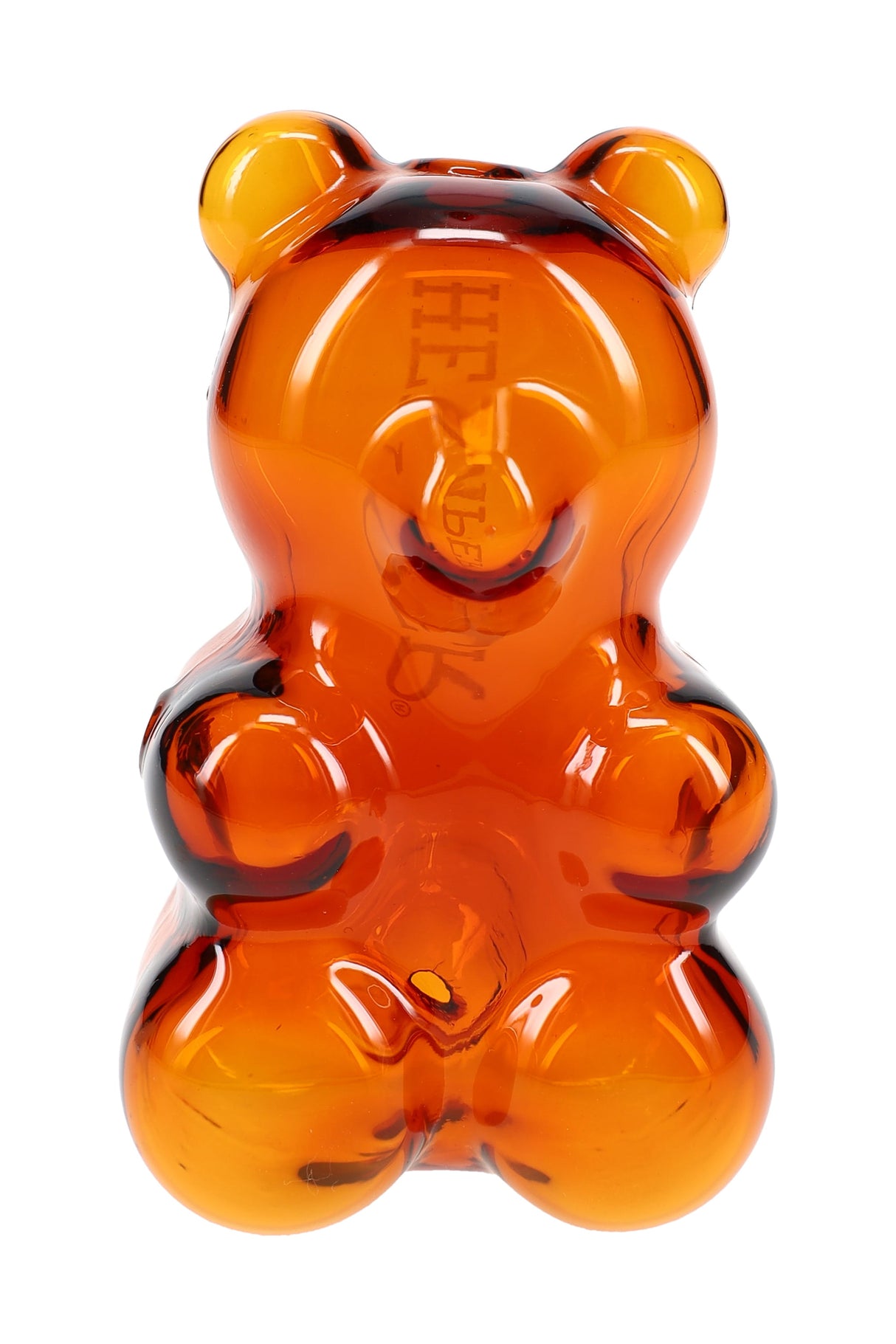 Angled view of gummy bear–shaped glass hand pipe showing sculpted bear details and smooth glossy candy-like finish