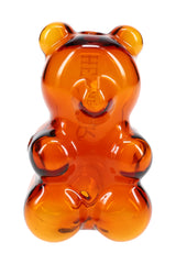 Angled view of gummy bear–shaped glass hand pipe showing sculpted bear details and smooth glossy candy-like finish