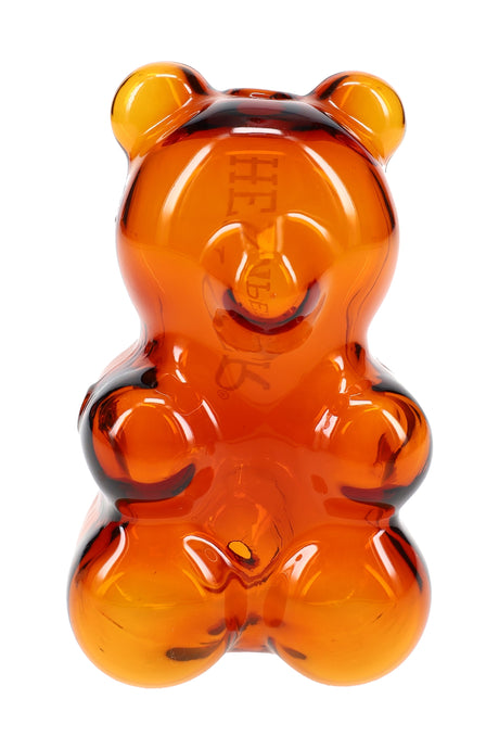 Angled view of gummy bear–shaped glass hand pipe showing sculpted bear details and smooth glossy candy-like finish