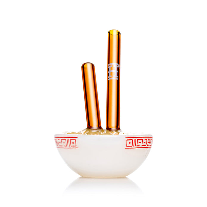 Front view ramen bowl glass hand pipe with upright amber chopstick mouthpiece and white bowl body, stable compact piece