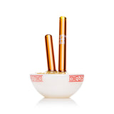 Front view ramen bowl glass hand pipe with upright amber chopstick mouthpiece and white bowl body, stable compact piece