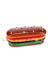 Side profile closeup of 5″ sandwich-style glass hand pipe with layered green/red/yellow bands and clear mouthpiece