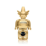 Centered front shot of gold Weedbrick glass hand pipe showing block-figure silhouette and glossy mirror finish
