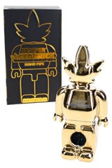 Hemper Weedbrick glass hand pipe with retail box, mirror-gold character design and dark bowl detail on white