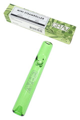 Green glass mini steamroller hand pipe with GRAV retail box, shown in angled product packaging view