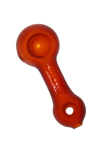 Red-orange frosted glass spoon hand pipe with GRAV logo and carb hole, shown in angled front view