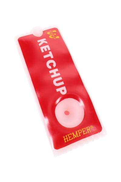 Close-up of red novelty glass hand pipe with ketchup packet design, white bowl detail, and frosted trim