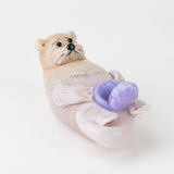Empire Glassworks Otter dry pipe side view with sea otter body, purple clam shell, and pearl detail