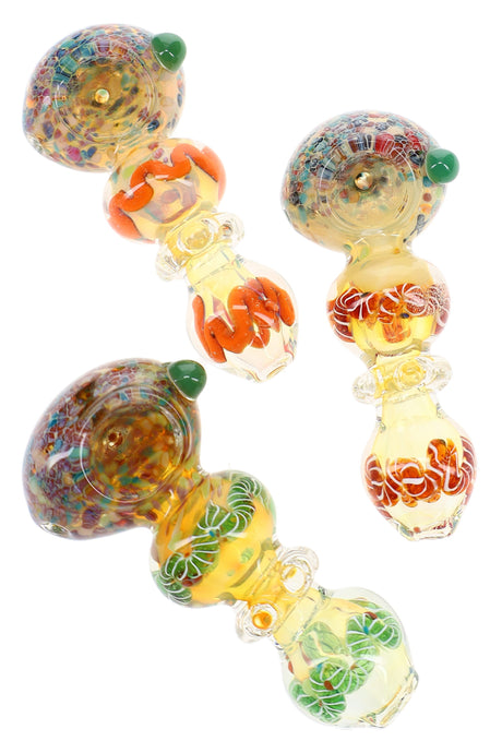 Assorted 4″ silver fumed spoon pipes with multicolor frit bowls, ring accents, and green marbles
