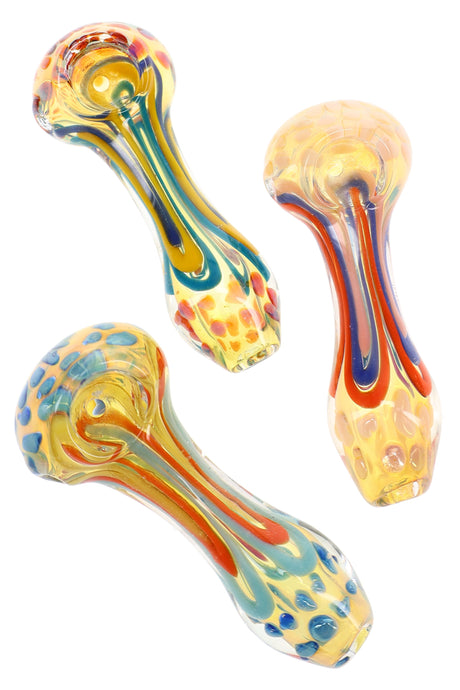Assorted 4″ color-changing glass spoon pipes with multicolor squiggle stripes and raised dot accents