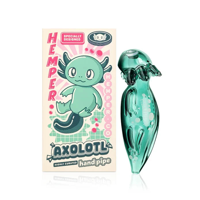 Green HEMPER Axolotl Glass Hand Pipe with sculpted limbs and a spotted tail beside its illustrated box