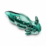 Angled view of the green HEMPER Axolotl Hand Pipe showing its head carb, sculpted limbs, and spotted tail