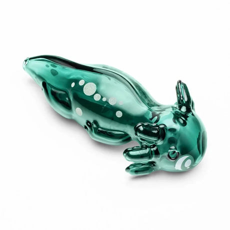 Angled view of the green HEMPER Axolotl Hand Pipe showing its head carb, sculpted limbs, and spotted tail