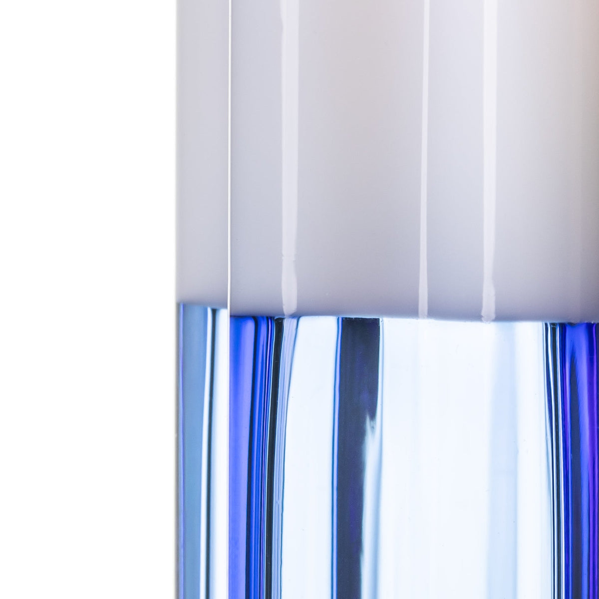 Close-up of BigFun! Pipesicle glass hand pipe showing the frosted white center and transparent blue glass base