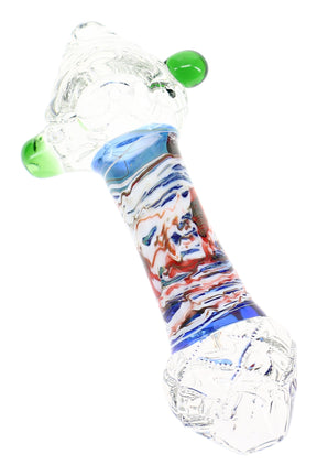 Clear 5″ glass hand pipe with multicolor painted stem, green marbles, pointed bowl, and spoon shape
