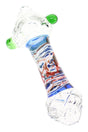 Clear 5″ glass hand pipe with multicolor painted stem, green marbles, pointed bowl, and spoon shape