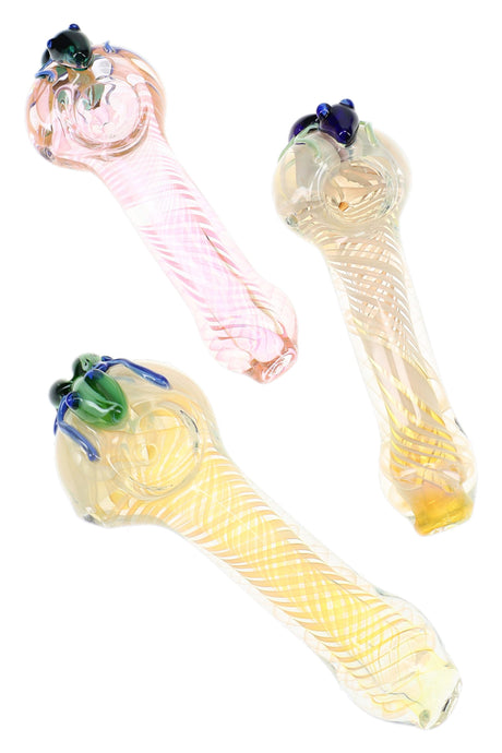 Assorted fumed spiral glass spoon pipes with critter accents, color-changing glass, and clear bowls