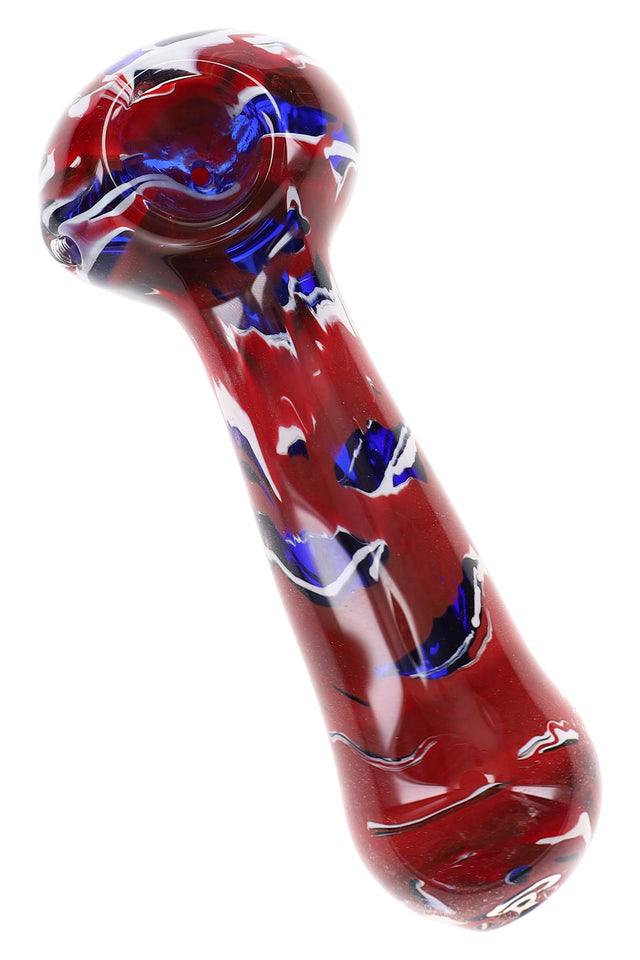 Red multicolor reverse glass spoon pipe with blue, white, and dark swirls across the bowl and stem