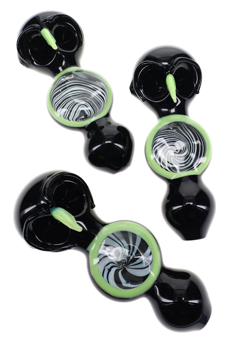Assorted black owl glass pipes with neon trim, double bowls, and varied spiral chest patterns