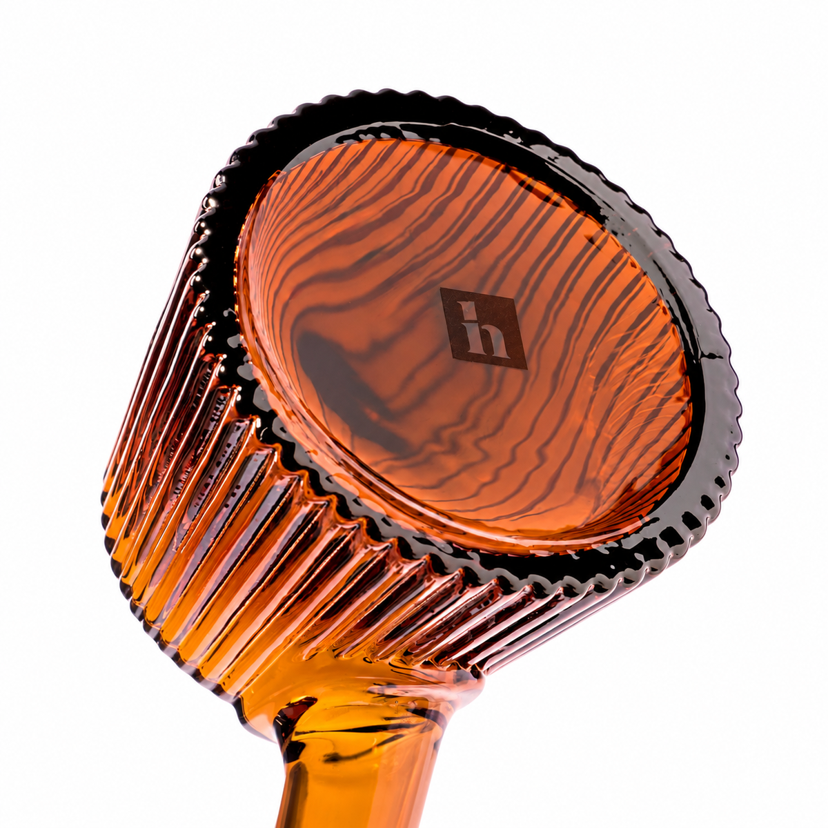 Underside of Baltic Amber NWTN Home Deco hand pipe showing broad glass base and fluted edge