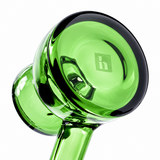 Bottom view of emerald NWTN Home Vesper glass hand pipe showing the thick circular base and etched logo