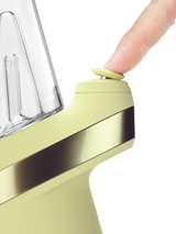 Puffco Peak Zest smart rig close-up with finger pressing the yellow Joystick Cap