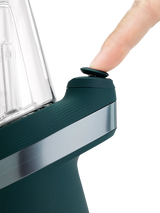 Closeup of Joystick Cap on Puffco New Peak Pine, finger pressing the top for directional airflow control.