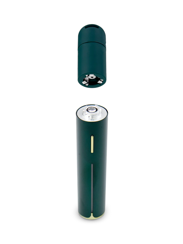 Puffco Pivot Pine shown with cap removed to reveal the quick-release 3D chamber and contacts on the device.