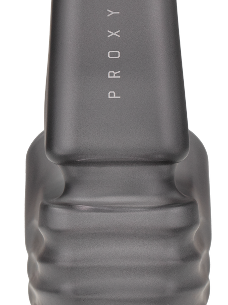 Close-up of Onyx Puffco New Proxy Wizard back section, smoky gray frosted glass with ribbed grip and vertical PROXY branding on the stem.